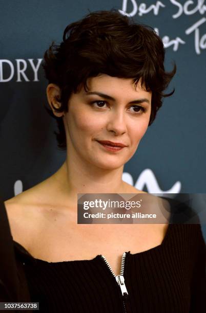 French actress Audrey Tautou arrives for the German premiere of her new film 'L'écume des jours' in Berlin, Germany, 17 September 2013. The film will...