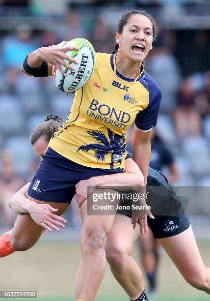 Trinity Mamoe of Bond University runs with the ball during the Aon Uni 7s match between Bond University and Adelaide University on September 22, 2018...