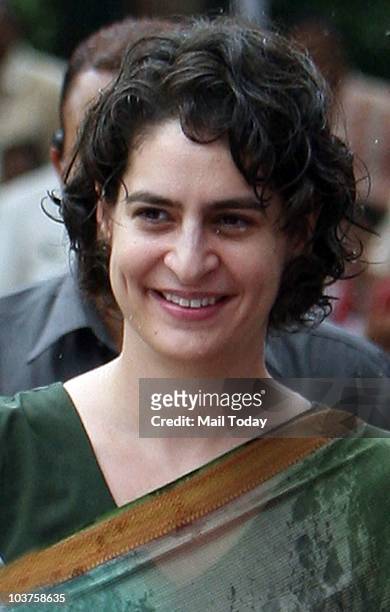 Priyanka Gandhi during the distribution of motorized tri-wheelers to disabled persons on the occasion of 66th birth anniversary of former Prime...