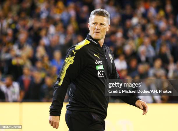 Tigers head coach Damien Hardwick walks off during the AFL Preliminary Final match between the Richmond Tigers and the Collingwood Magpies on...