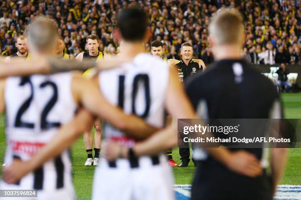 Tigers head coach Damien Hardwick lines up opposite Magpies head coach Nathan Buckley during the AFL Preliminary Final match between the Richmond...