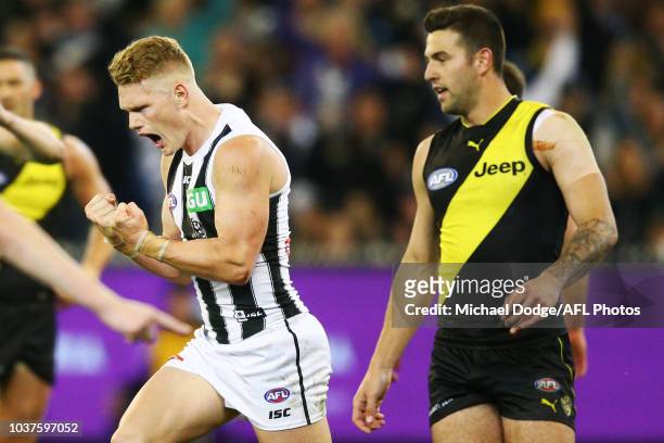 Adam Treloar of the Magpies celebrates a goal during the AFL Preliminary Final match between the Richmond Tigers and the Collingwood Magpies on...
