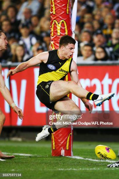 Jack Higgins of the Tigers misses a kick for goal during the AFL Preliminary Final match between the Richmond Tigers and the Collingwood Magpies on...