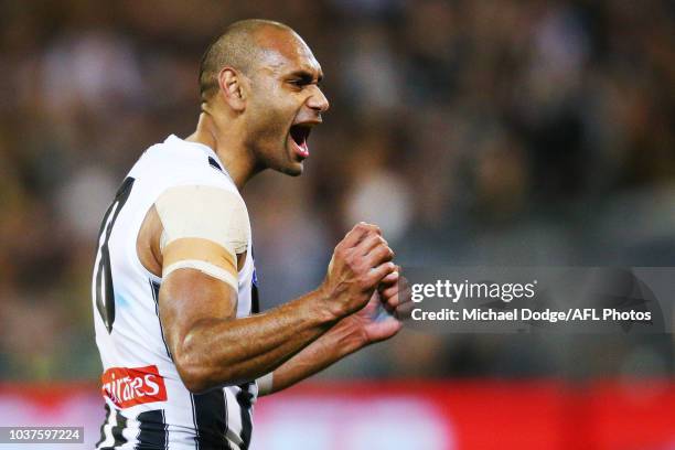 Travis Varcoe of the Magpies celebrates a goal by a teamate during the AFL Preliminary Final match between the Richmond Tigers and the Collingwood...