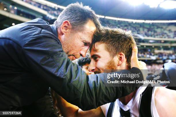 Tom Phillips of the Magpies celebrates the win during the AFL Preliminary Final match between the Richmond Tigers and the Collingwood Magpies on...