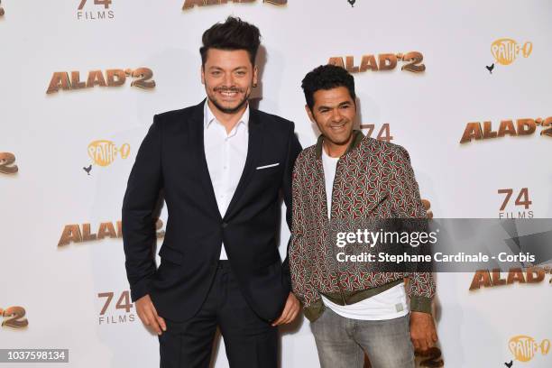 Kev Adams and Jamel Debbouze attend Alad'2 Paris Premiere at Le Grand Rex on September 21, 2018 in Paris, France.