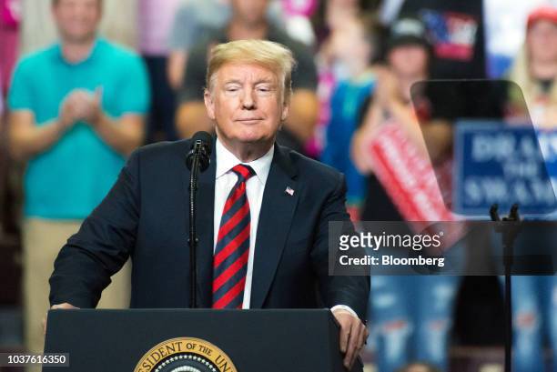 President Donald Trump pauses during a rally in Springfield, Missouri, U.S., on Friday, Sept. 21, 2018. Trump vowed to rid the Justice Department and...