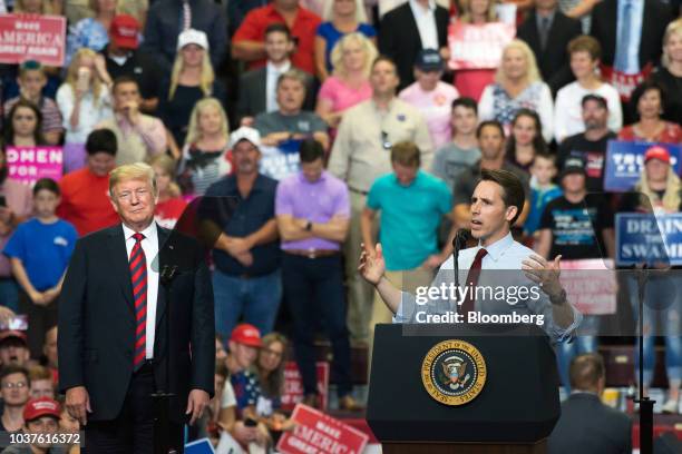 Josh Hawley, Republican senate candidate for Missouri, right, speaks as U.S. President Donald Trump looks on during a rally in Springfield, Missouri,...