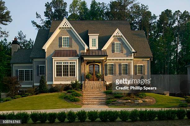 traditional suburban house - home facade stock pictures, royalty-free photos & images