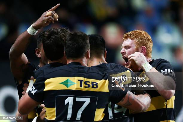 Tom Florence of Taranaki celebrates the try of Ciarhan Matoe during the round six Mitre 10 Cup match between Taranaki and Auckland at Yarrow Stadium...