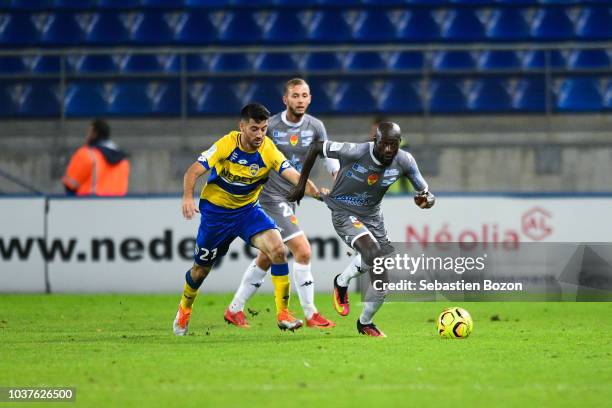 Nando of Sochaux and Ousmane Cissokho of Orleans during the Ligue 2 match between Sochaux and Orleans at Stade Auguste Bonal on September 21, 2018 in...