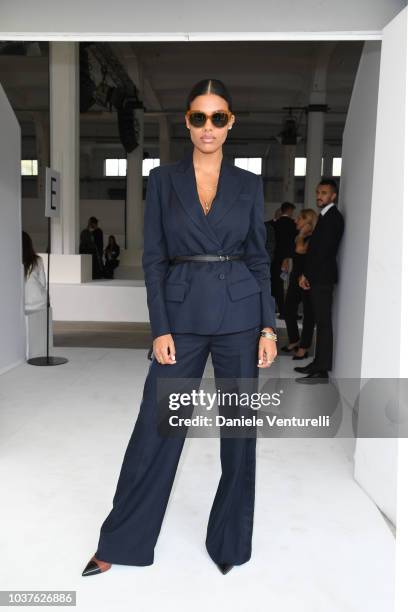 Tina Kunakey attends the Roberto Cavalli show during Milan Fashion Week Spring/Summer 2019 on September 22, 2018 in Milan, Italy.