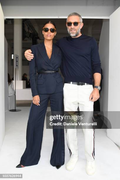 Tina Kunakey and Vincent Cassel attend the Roberto Cavalli show during Milan Fashion Week Spring/Summer 2019 on September 22, 2018 in Milan, Italy.