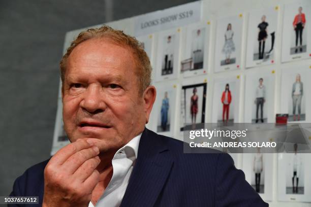 Italian fashion designer Ermanno Scervino is pictured in the backstage prior to the presentation of his Women's Spring/Summer 2019 fashion show in...