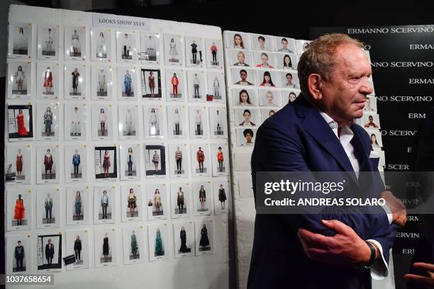 Italian fashion designer Ermanno Scervino is pictured in the backstage prior to the presentation of his Women's Spring/Summer 2019 fashion show in...