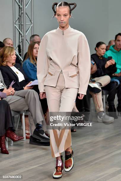 Model walks the runway at the Kiko Kostadinov Ready to Wear Spring/Summer 2019 fashion show during London Fashion Week September 2018 on September...