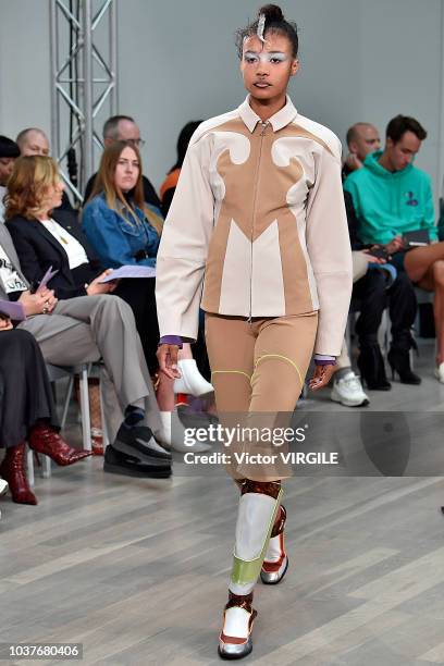 Model walks the runway at the Kiko Kostadinov Ready to Wear Spring/Summer 2019 fashion show during London Fashion Week September 2018 on September...