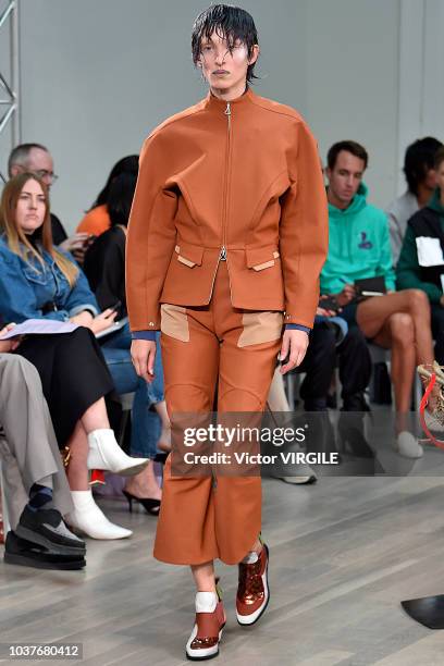 Model walks the runway at the Kiko Kostadinov Ready to Wear Spring/Summer 2019 fashion show during London Fashion Week September 2018 on September...