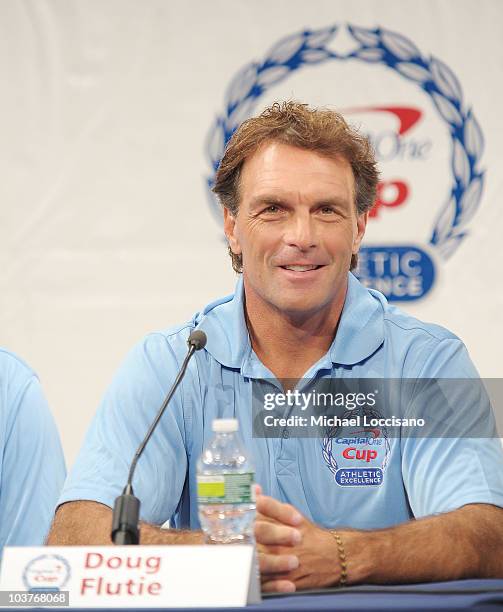 Former professional football player Doug Flutie addresses the press during the Capital One Division 1 College Sports Award launch at The Times Center...