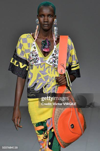 Model walks the runway at the Matty Bovan Ready to Wear Spring/Summer 2019 fashion show during London Fashion Week September 2018 on September 14,...