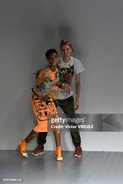 Winnie Harlow and Fashion designer Matty Bovan walks the runway at the Matty Bovan Ready to Wear Spring/Summer 2019 fashion show during London...