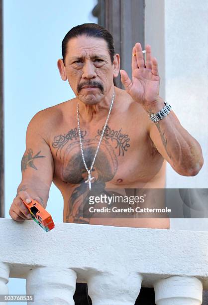 Actor Danny Trejo looks out from his hotel balcony during the 67th Venice Film Festival on September 1, 2010 in Venice, Italy.