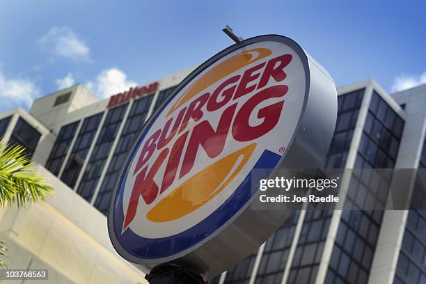 Burger King sign hangs outside a restaurant as reports indicate the company may be considering a sale of itself on September 1, 2010 in Miami,...