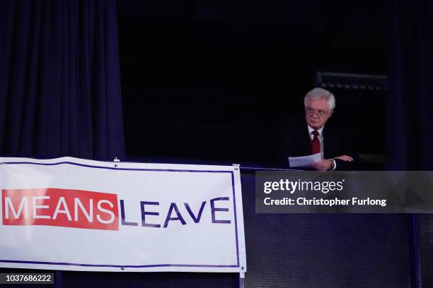 Conservative MP David Davis, the former Secretary of State for Exiting the European Union, watches from a balcony while attending a Leave Means Leave...