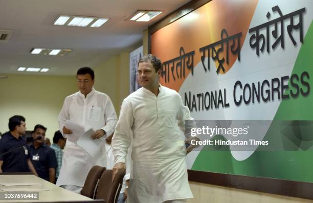 Congress Party President Rahul Gandhi with spokesperson Randeep Singh Surjewala arrive to address media person on the Rafale Scam issue at AICC HQ,...