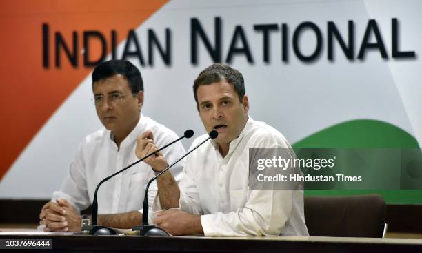 Congress Party President Rahul Gandhi with spokesperson Randeep Singh Surjewala address media person on the Rafale Scam issue at AICC HQ, on...