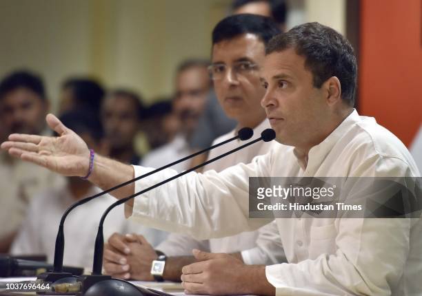 Congress Party President Rahul Gandhi with spokesperson Randeep Singh Surjewala address media person on the Rafale Scam issue at AICC HQ, on...