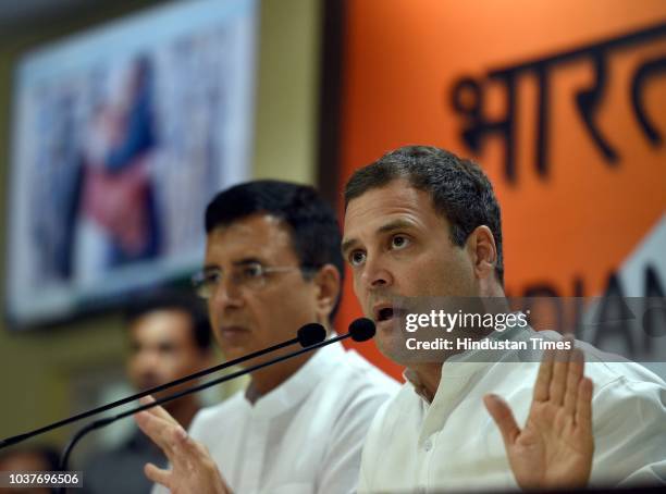 Congress Party President Rahul Gandhi with spokesperson Randeep Singh Surjewala address media person on the Rafale Scam issue at AICC HQ, on...