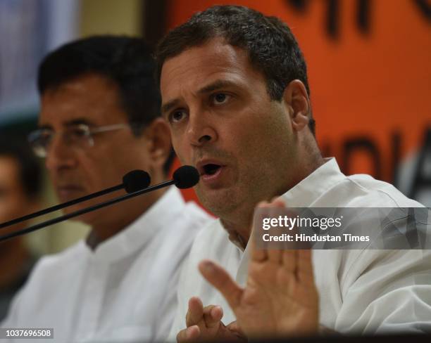 Congress Party President Rahul Gandhi with spokesperson Randeep Singh Surjewala address media person on the Rafale Scam issue at AICC HQ, on...