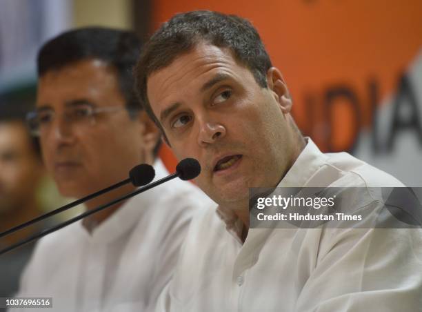 Congress Party President Rahul Gandhi with spokesperson Randeep Singh Surjewala address media person on the Rafale Scam issue at AICC HQ, on...