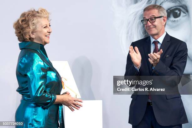 Producer Esther Garcia receives the National Cinema Award from Culture minister Jose Guirao during the 66th San Sebastian International Film Festival...