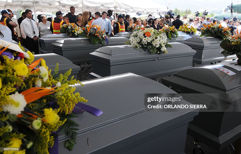 View of the coffins of the 16 Honduran v