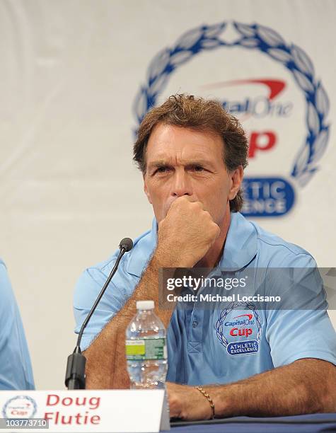 Former professional football player Doug Flutie addresses the press during the Capital One Division 1 College Sports Award launch at The Times Center...