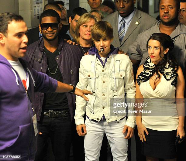 **Exclusive** Scooter Braun, Usher and Justin Bieber backstage before he performs at Madison Square Garden on August 31, 2010 in New York City.