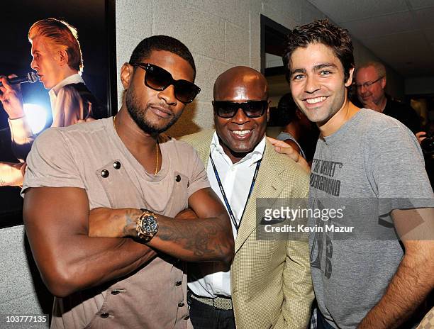 **Exclusive** Usher, Antonio "L.A." Reid and Adrian Grenier backstage before Justin Bieber performs at Madison Square Garden on August 31, 2010 in...