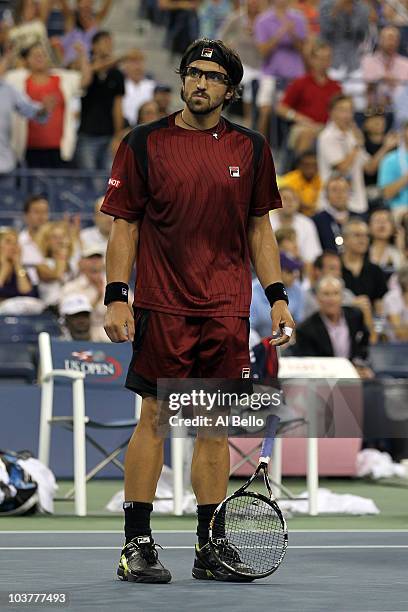 Janko Tipsarevic of Serbia celebrates after defeating Andy Roddick of the United States during his second round men's singles match on day three of...