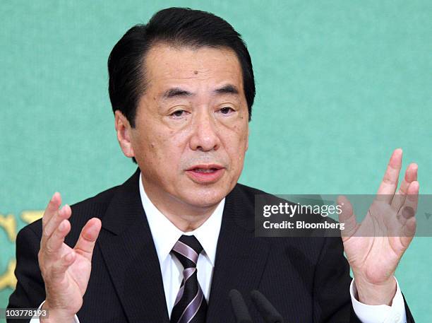 Naoto Kan, Japan's prime minister and leader of the ruling Democratic Party of Japan , speaks during a panel discussion for their party's...