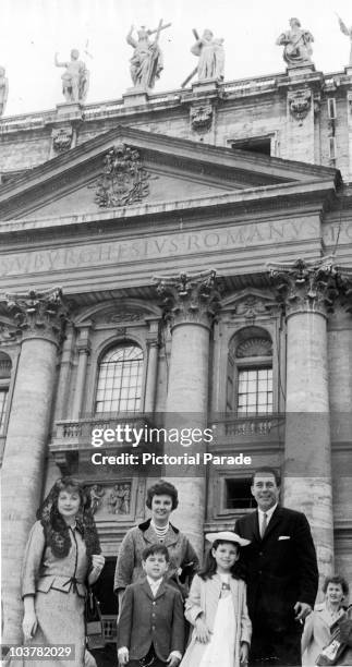 American actress Lucille Ball with her cousin Cleo Morgan, Cleo's husband Ken, and Lucille's children, Lucie and Desi Jr. Outside St. Peter's...