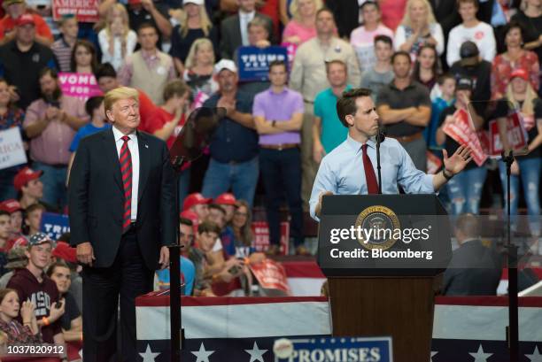 Josh Hawley, Republican senate candidate for Missouri, right, speaks as U.S. President Donald Trump smiles during a rally in Springfield, Missouri,...