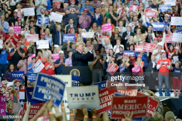 President Donald Trump gestures during a rally in Springfield, Missouri, U.S., on Friday, Sept. 21, 2018. Trump vowed to rid the Justice Department...