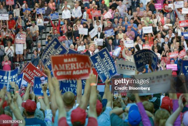 President Donald Trump pauses while speaking during a rally in Springfield, Missouri, U.S., on Friday, Sept. 21, 2018. Trump vowed to rid the Justice...