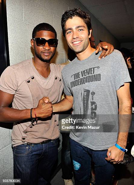 **Exclusive** Usher and Adrian Grenier backstage before Justin Bieber performs at Madison Square Garden on August 31, 2010 in New York City.
