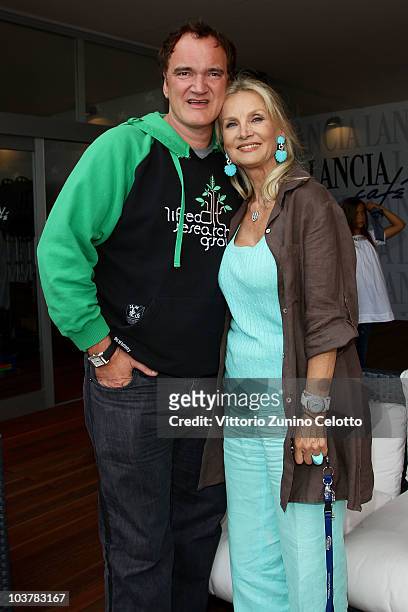 Quentin Tarantino and Barbara Bouchet attend the Lancia Cafe during the 67th Venice International Film Festival on September 2, 2010 in Venice, Italy.