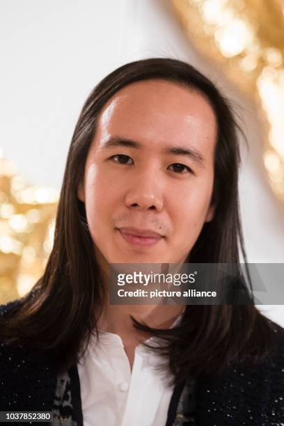 Designer William Fan is seen backstage during the show of fashion label Augustin Teboul during the Berlin Fashion Week in Berlin, Germany, 21 January...