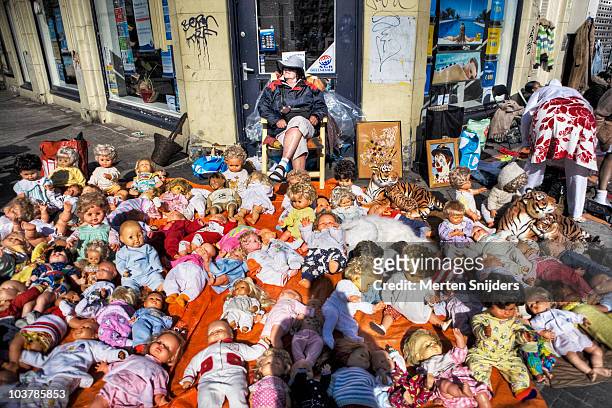 queensday freemarket puppet sales. - kings day celebration in amsterdam stock pictures, royalty-free photos & images
