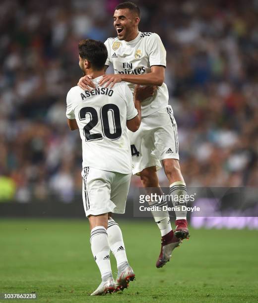Marco Asensio of Real Madrid celebrates with Daniel Ceballos after scoring his teams opening goal during the La Liga match between Real Madrid CF and...